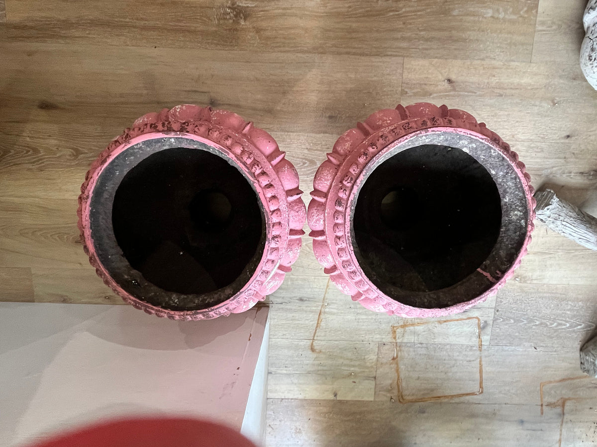 Pair of French Pink iron garden urns,