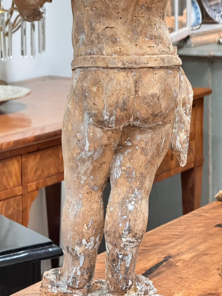 A Continental Carved Wood Putto, c. 1650 - Helen Storey Antiques