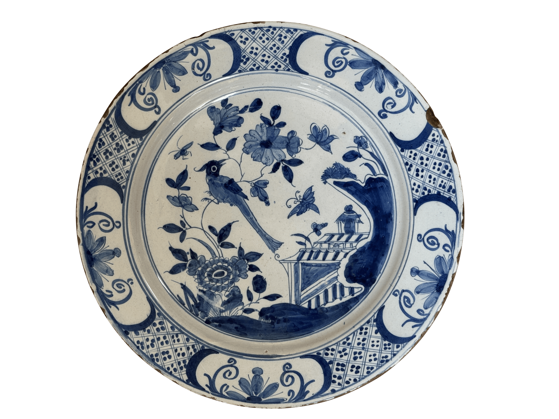 Fine English delft charger featuring a chinoiserie garden scene
