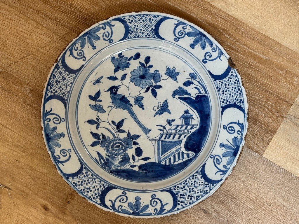 Fine English delft charger featuring a chinoiserie garden scene - Helen Storey Antiques