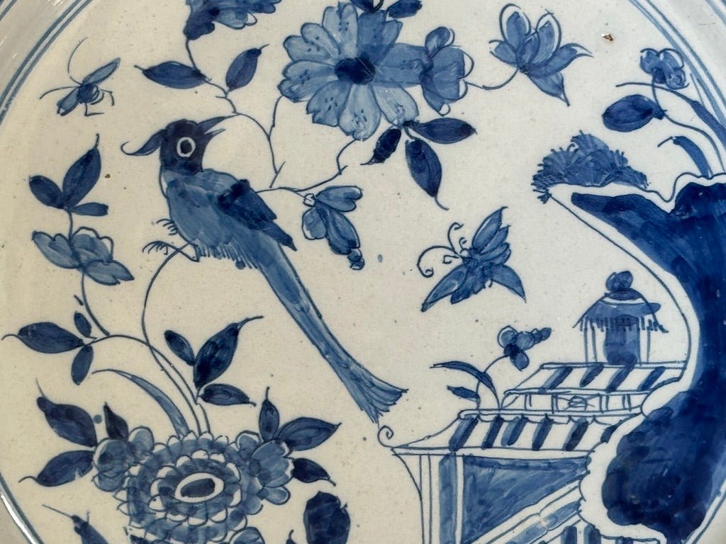 Fine English delft charger featuring a chinoiserie garden scene - Helen Storey Antiques