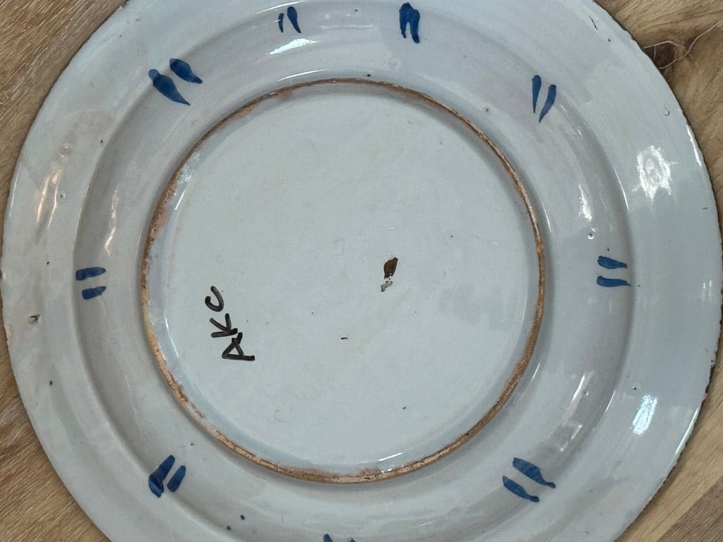 Fine English delft charger featuring a chinoiserie garden scene - Helen Storey Antiques