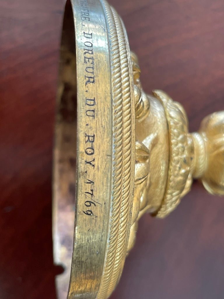 A rare pair of Louis XV gilt bronze candlesticks signed P. Gouthiere - Helen Storey Antiques