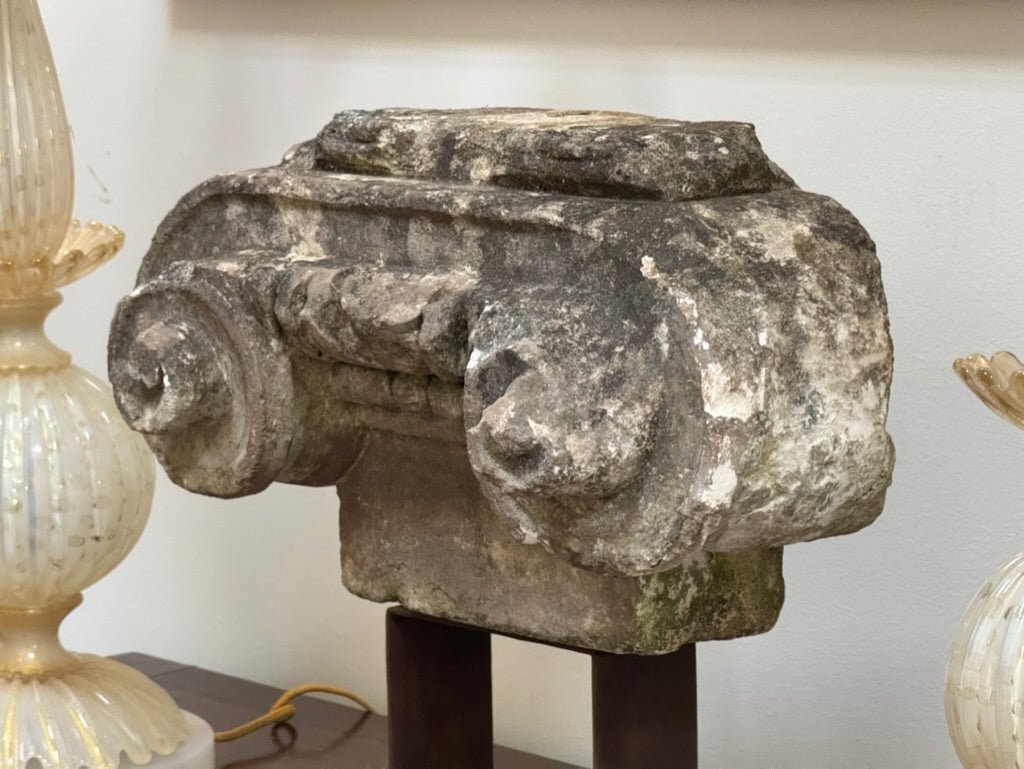 Ancient stone Ionic capital on an iron stand, French - Helen Storey Antiques