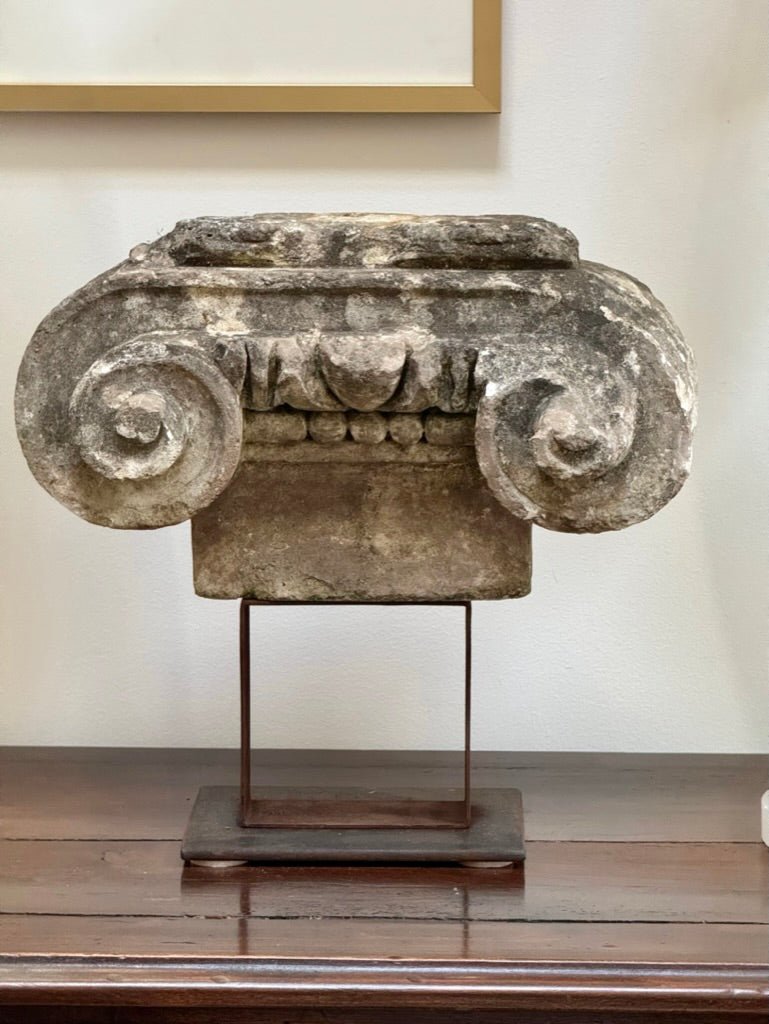 Ancient stone Ionic capital on an iron stand, French - Helen Storey Antiques